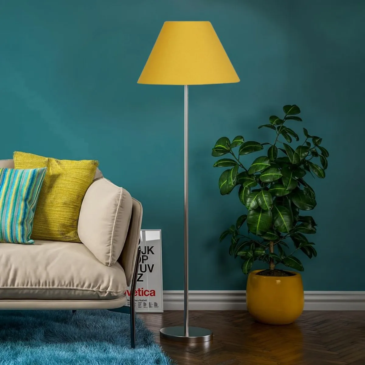 Yellow floor lamp with slim metal stand beside a sofa and potted plant