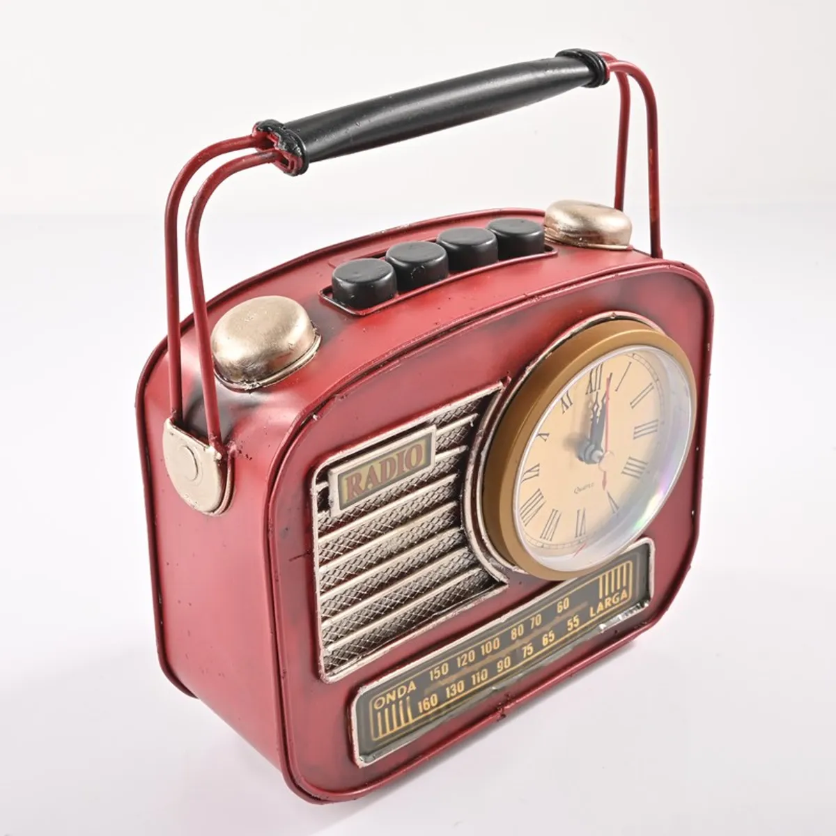 Angled view of red radio-style showpiece with handle and round clock