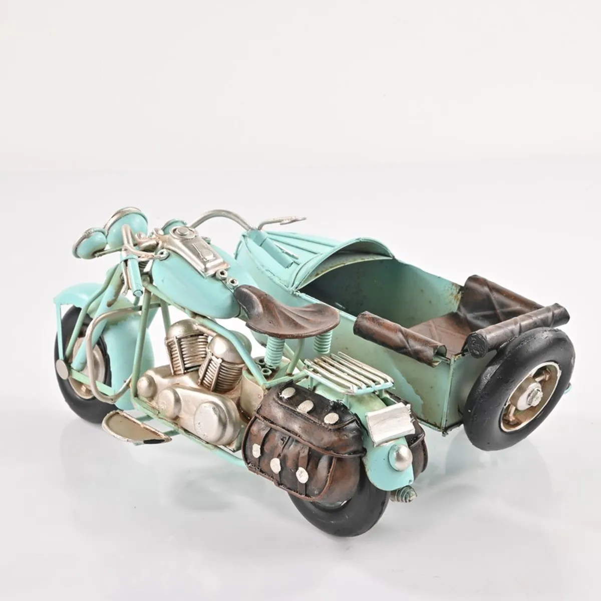 Rear angled view of blue motorcycle sidecar showpiece