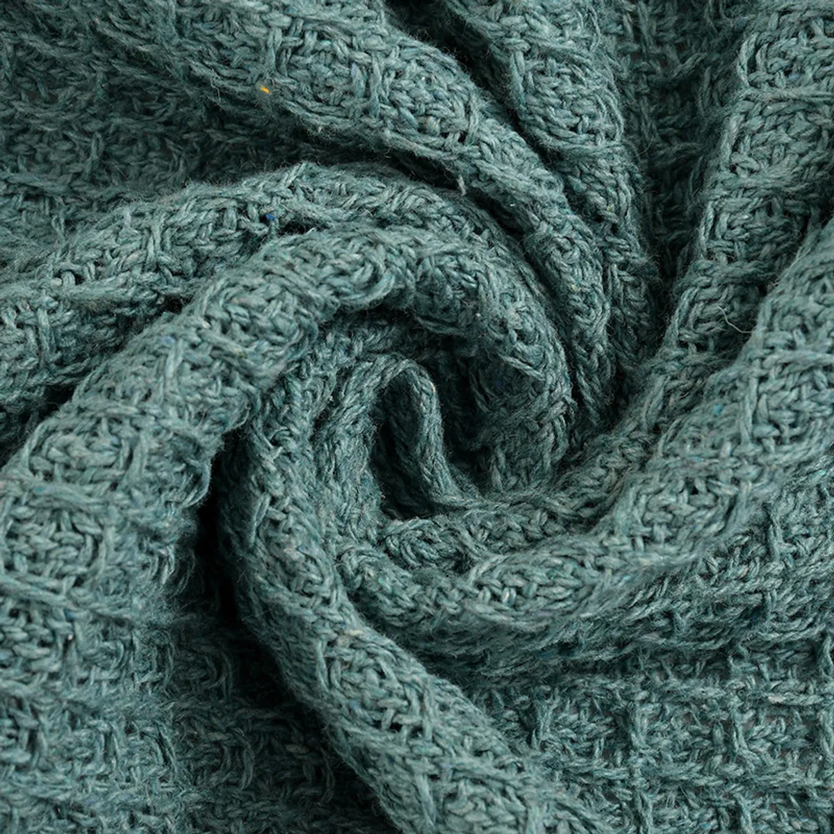 Close-up of teal waffle weave fabric texture