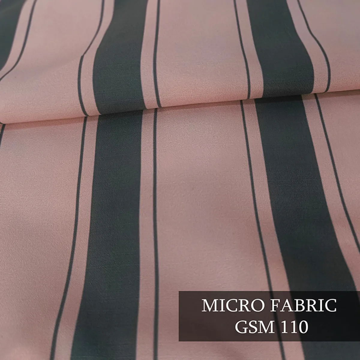 Close-up view of the cushion cover's pink and grey stripe pattern