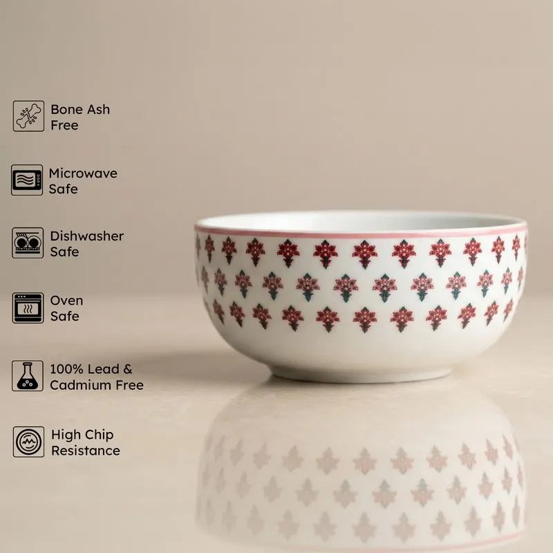 White serving bowl with pink floral motif and glossy finish