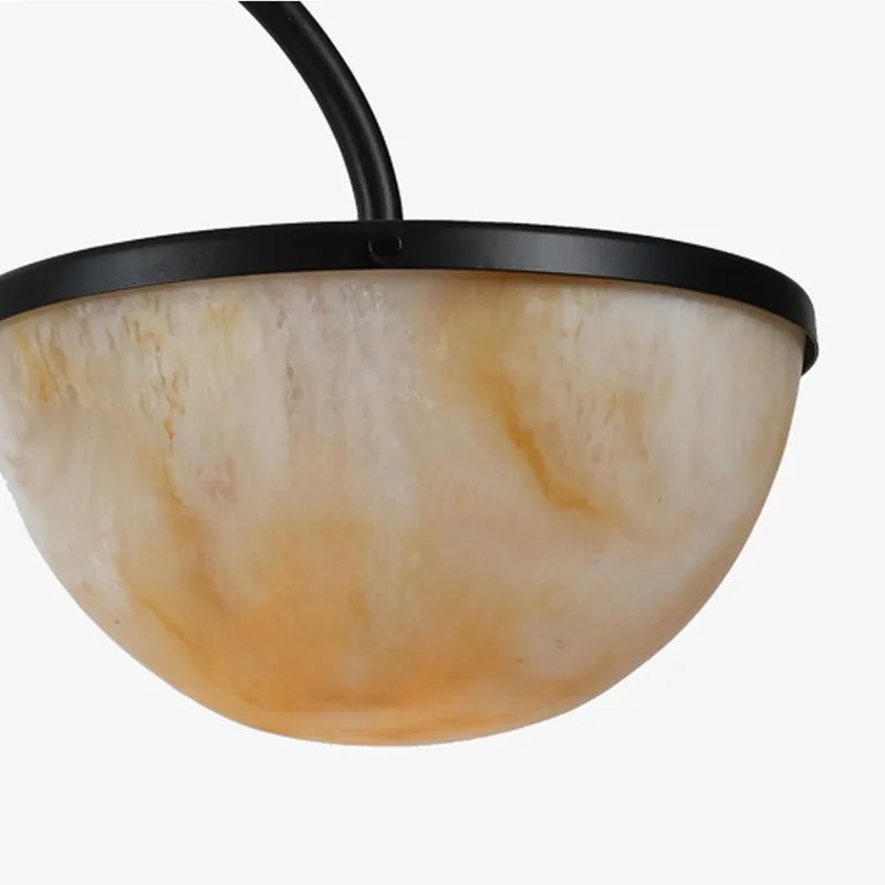 Close-up of marbled yellow and white semi-sphere lamp shade