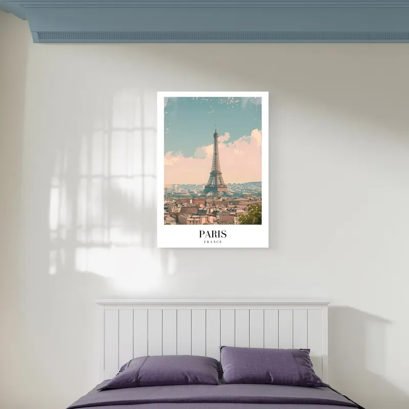 Paris cityscape canvas art hung above a bed in a bright bedroom