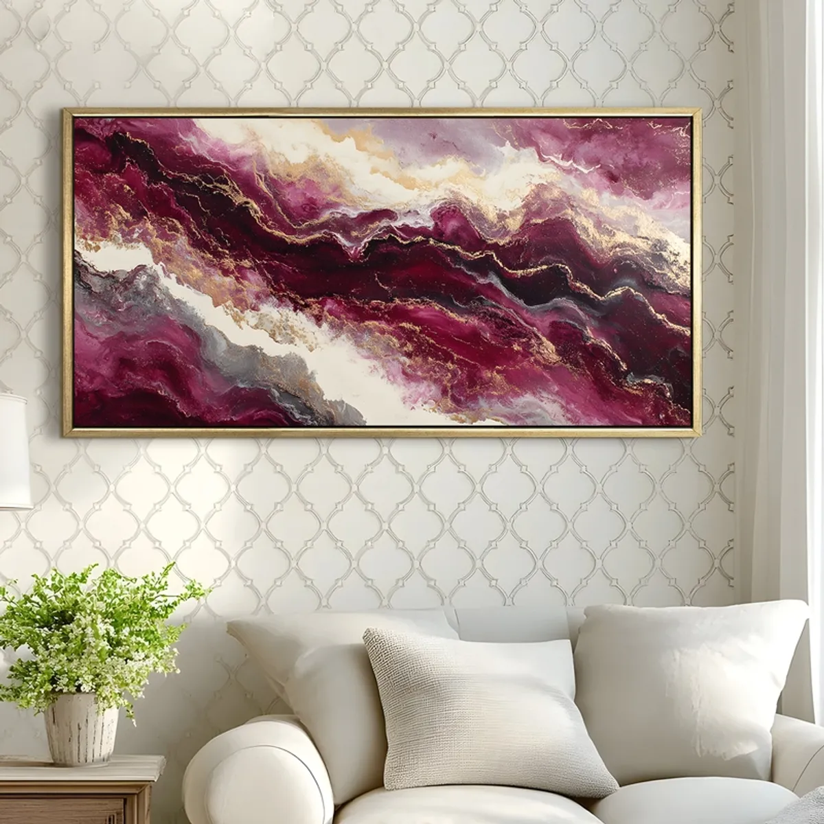 Large framed abstract painting in plum and gold on a patterned wall