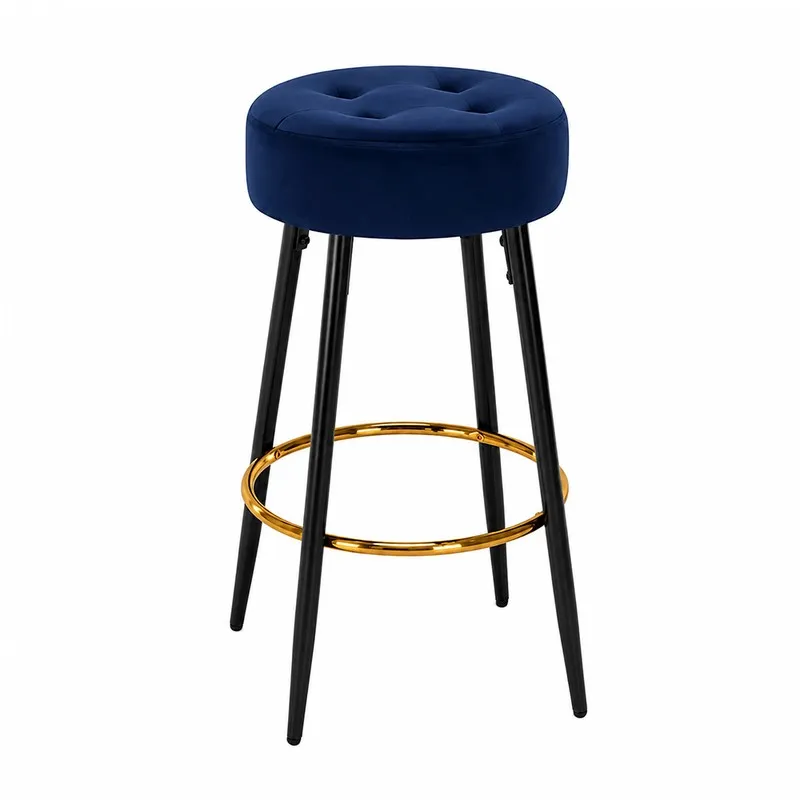 Blue round bar stool with black legs and gold circular footrest on white background