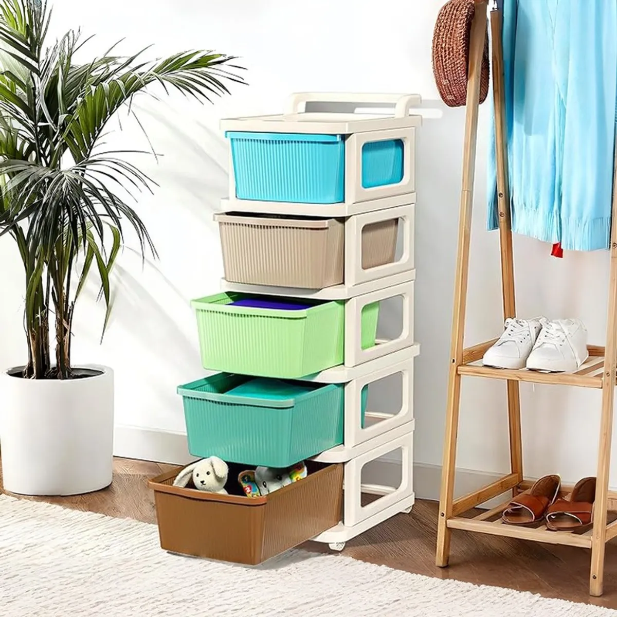 Storage rack with several colourful drawers pulled out in a room