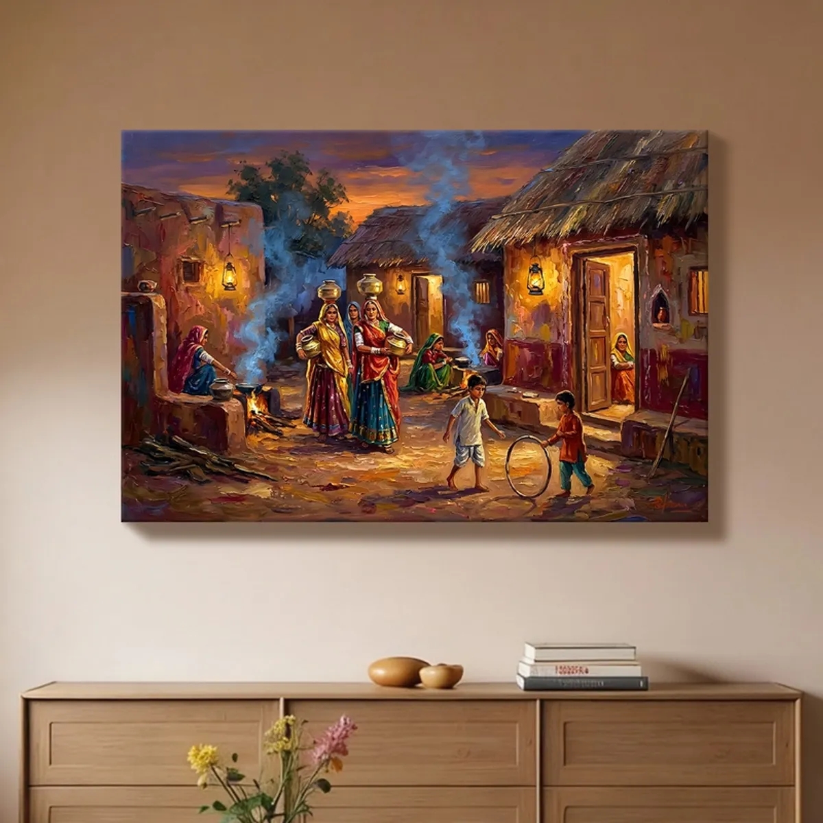 Village evening wall painting with warm lights displayed above a sideboard