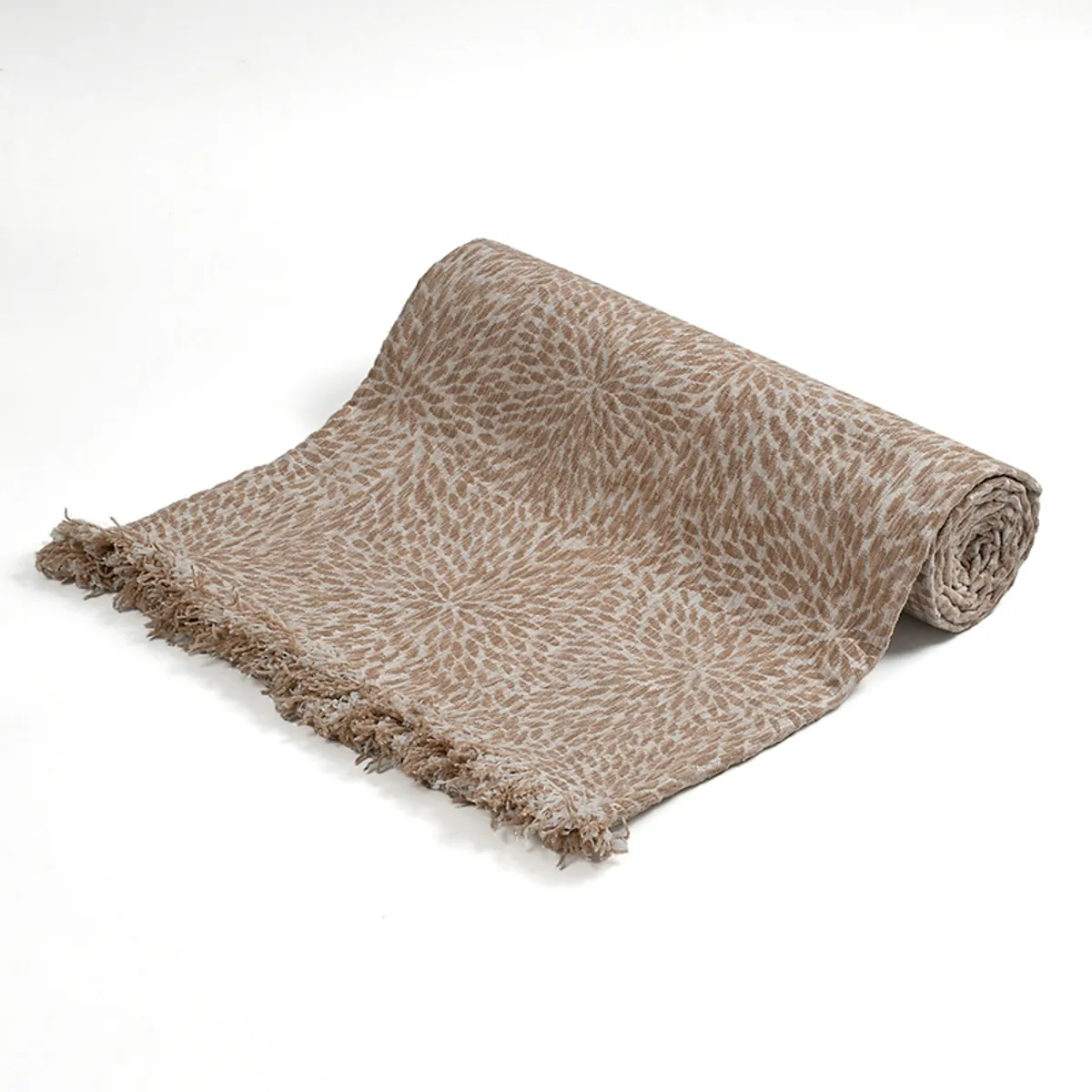Rolled beige throw with all-over pattern and fringed edge