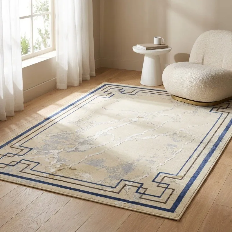 Beige rectangular carpet with dark border placed in a bright room