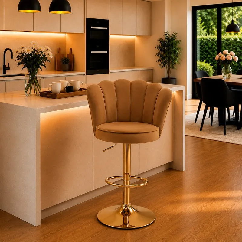 Brown velvet bar chair with scalloped back and gold-toned metal base in a modern kitchen