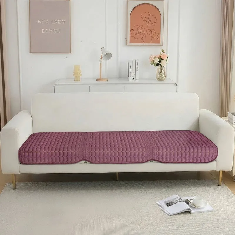Wine-purple geometric velvet cover arranged across a 3-seater sofa