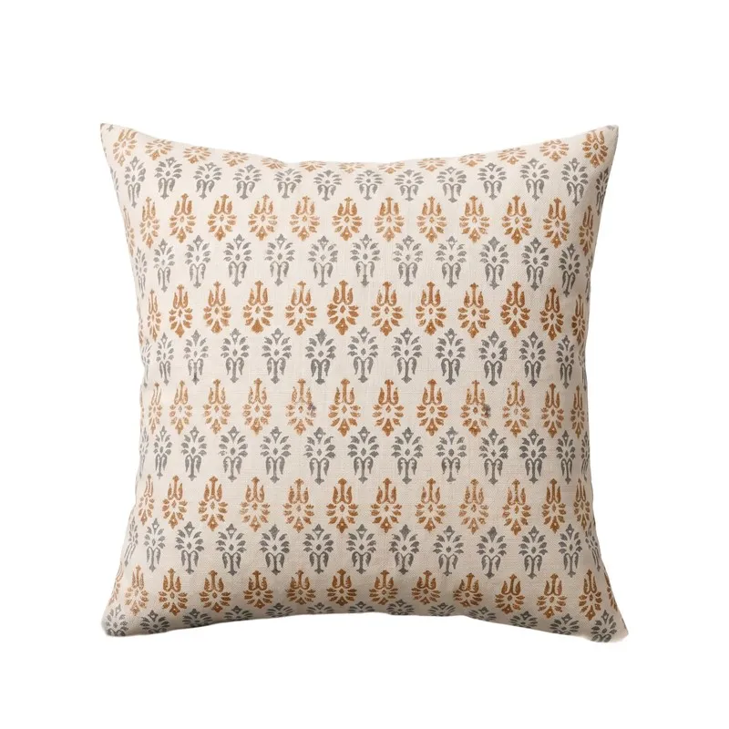 Square white cushion cover with orange and grey ethnic floral print