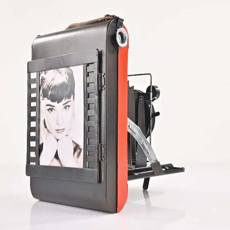 Side view of the vintage camera showpiece with a portrait image panel