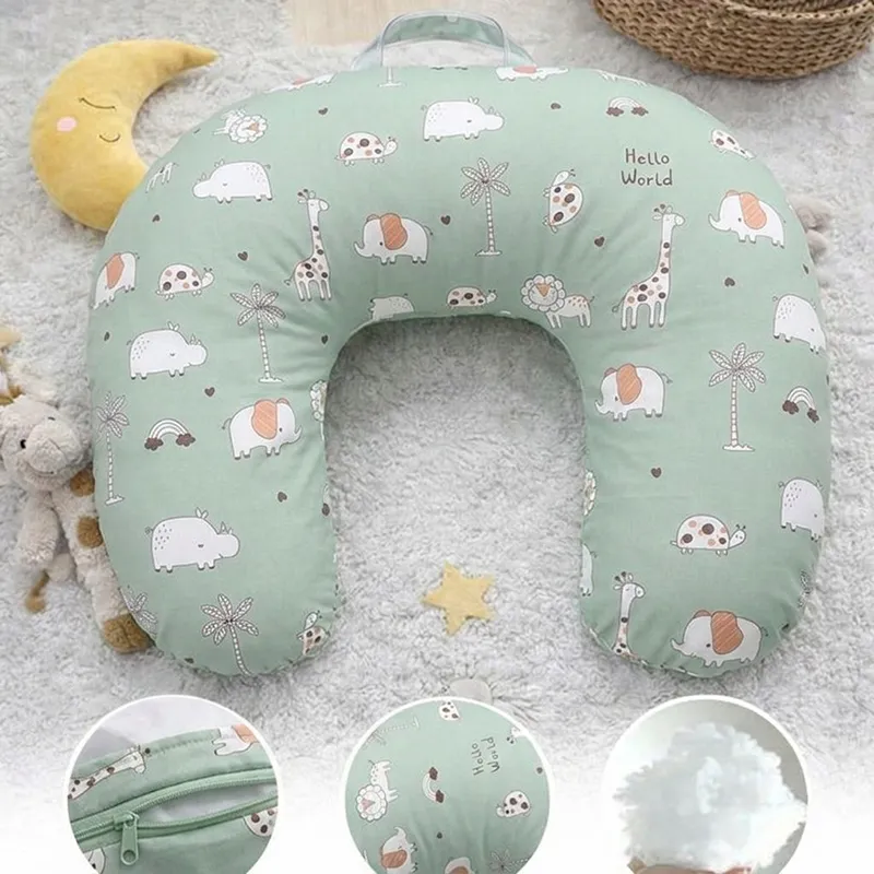 Top view of green U-shape feeding pillow with playful animal print