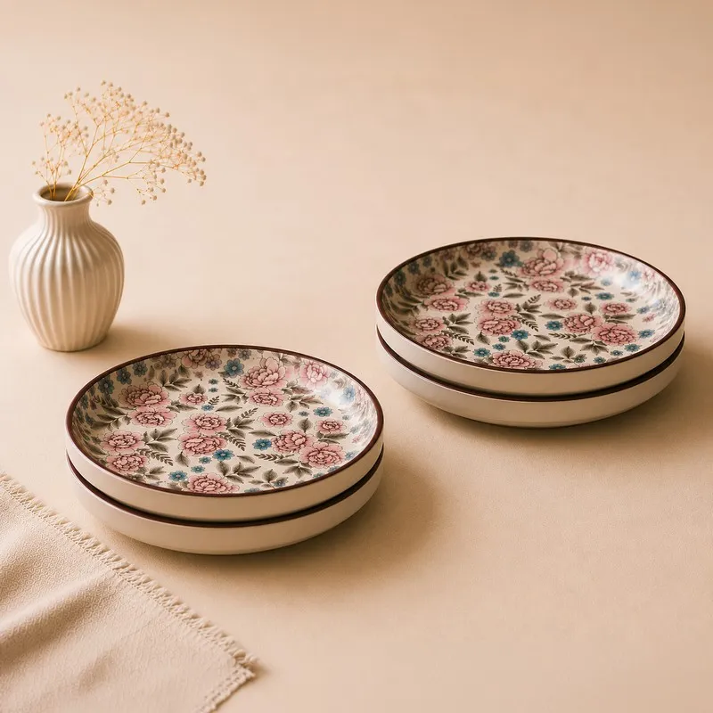 Two stacked round ceramic dinner plates with multicolour botanical motif