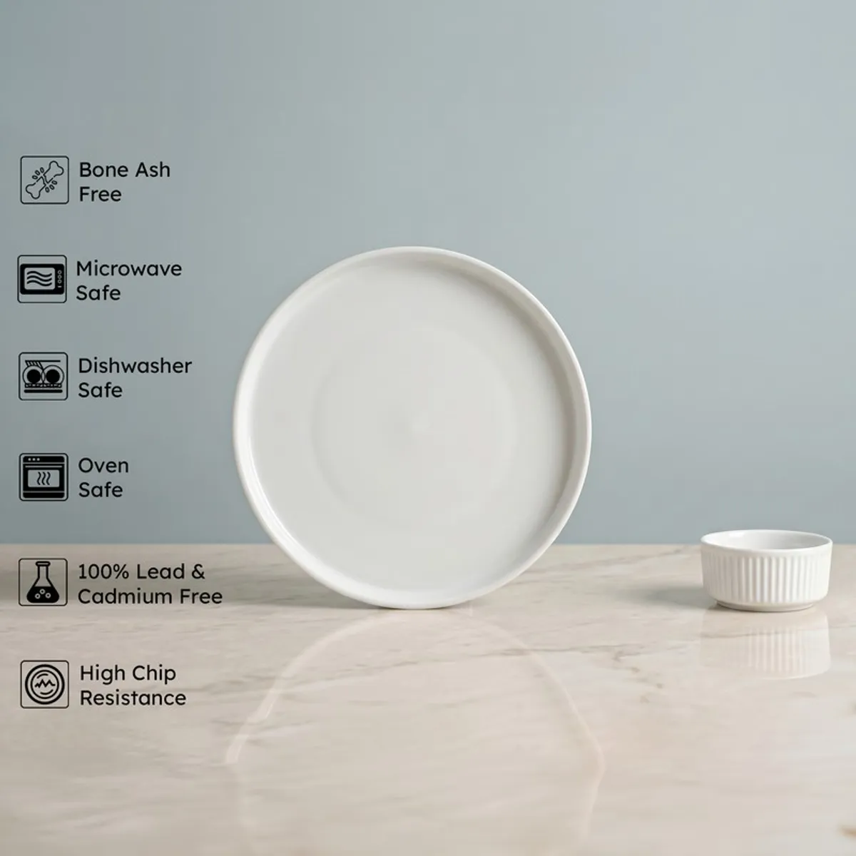 White plate and ribbed bowl from the porcelain dinner set