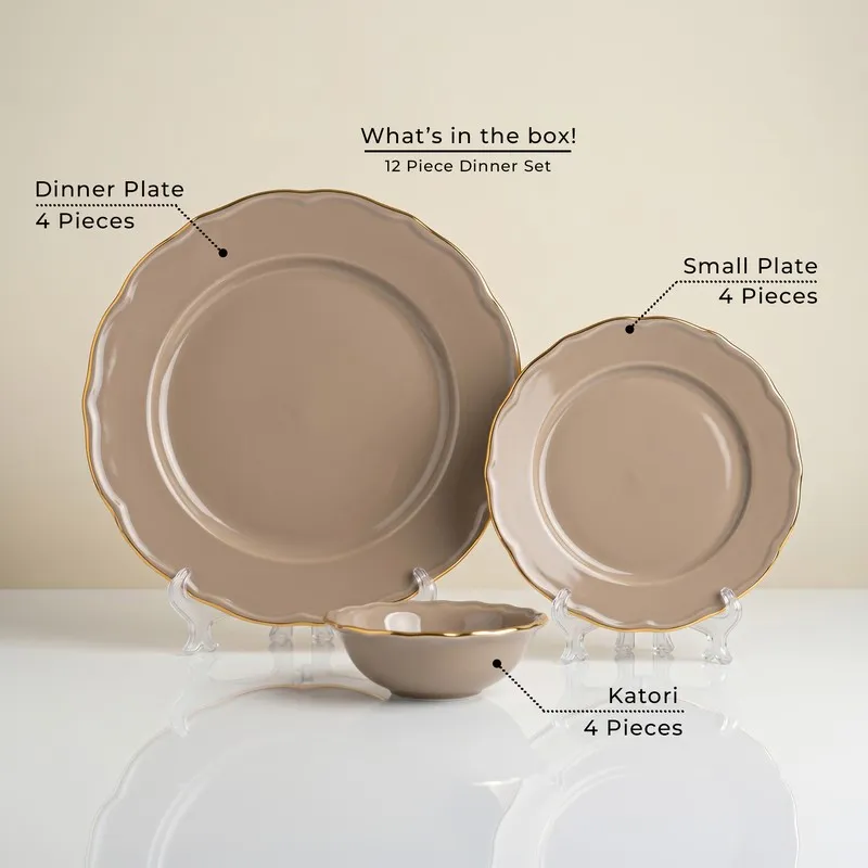 Grey and gold dinner plate, side plate and bowl displayed together