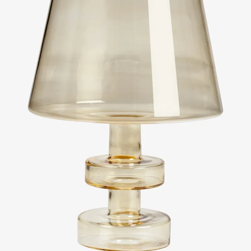 Close-up of the central stem and upper section of the amber glass holder