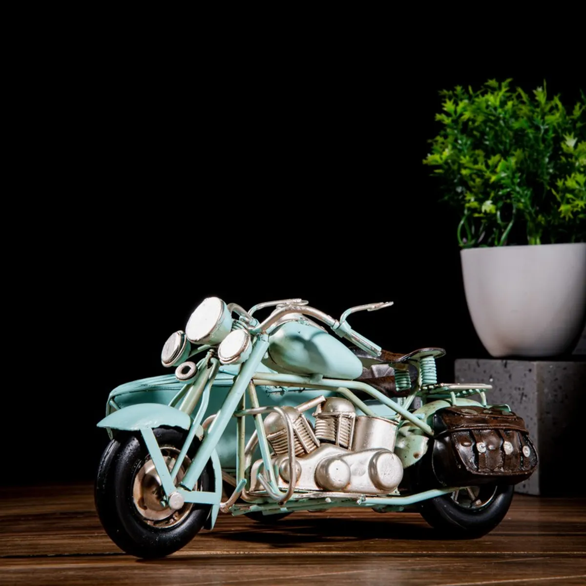 Front angled view of blue motorcycle showpiece with metallic details
