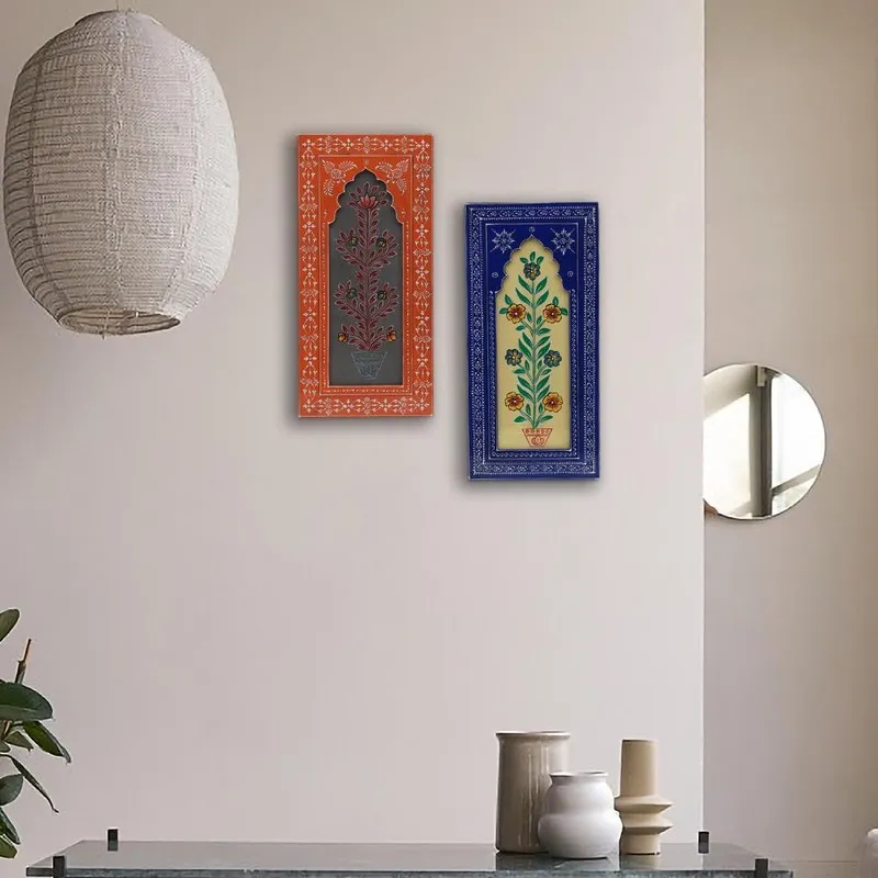 Set of two colourful rectangular wall accents mounted on a neutral wall