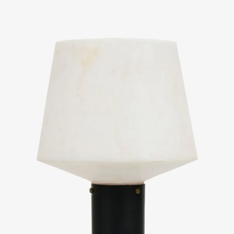 Close-up of the off-white resin shade on the table lamp