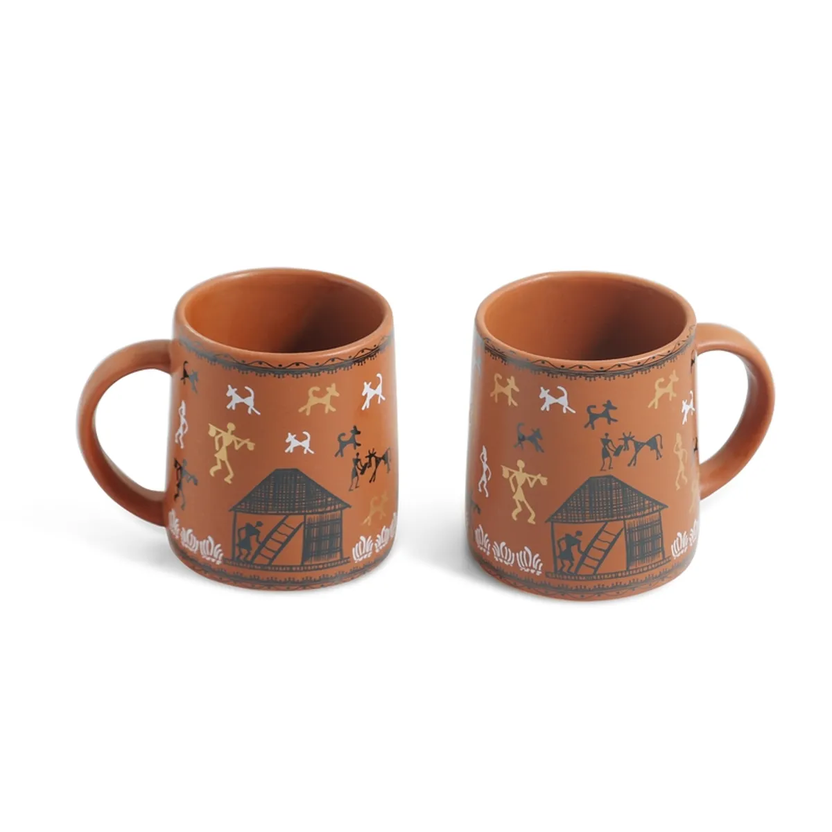 Two brown cylindrical mugs with Warli artwork displayed against a white background.