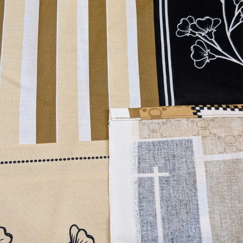 Close-up of striped and floral printed sections of the bedsheet fabric