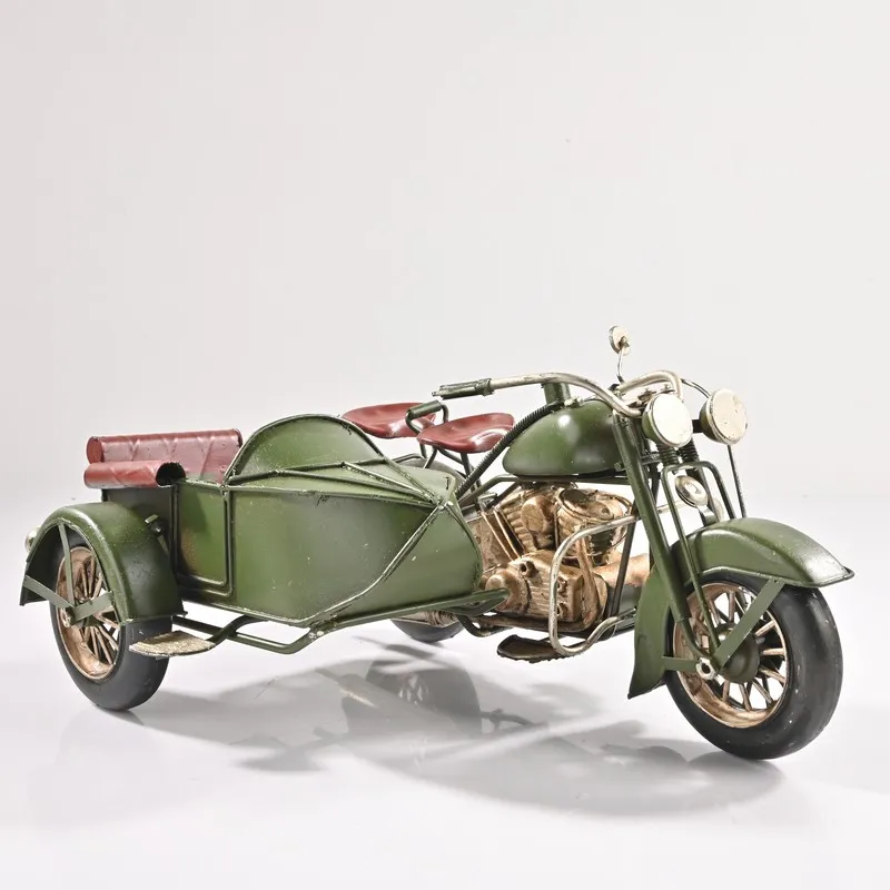 Front angled view of olive green vintage motorcycle sidecar showpiece