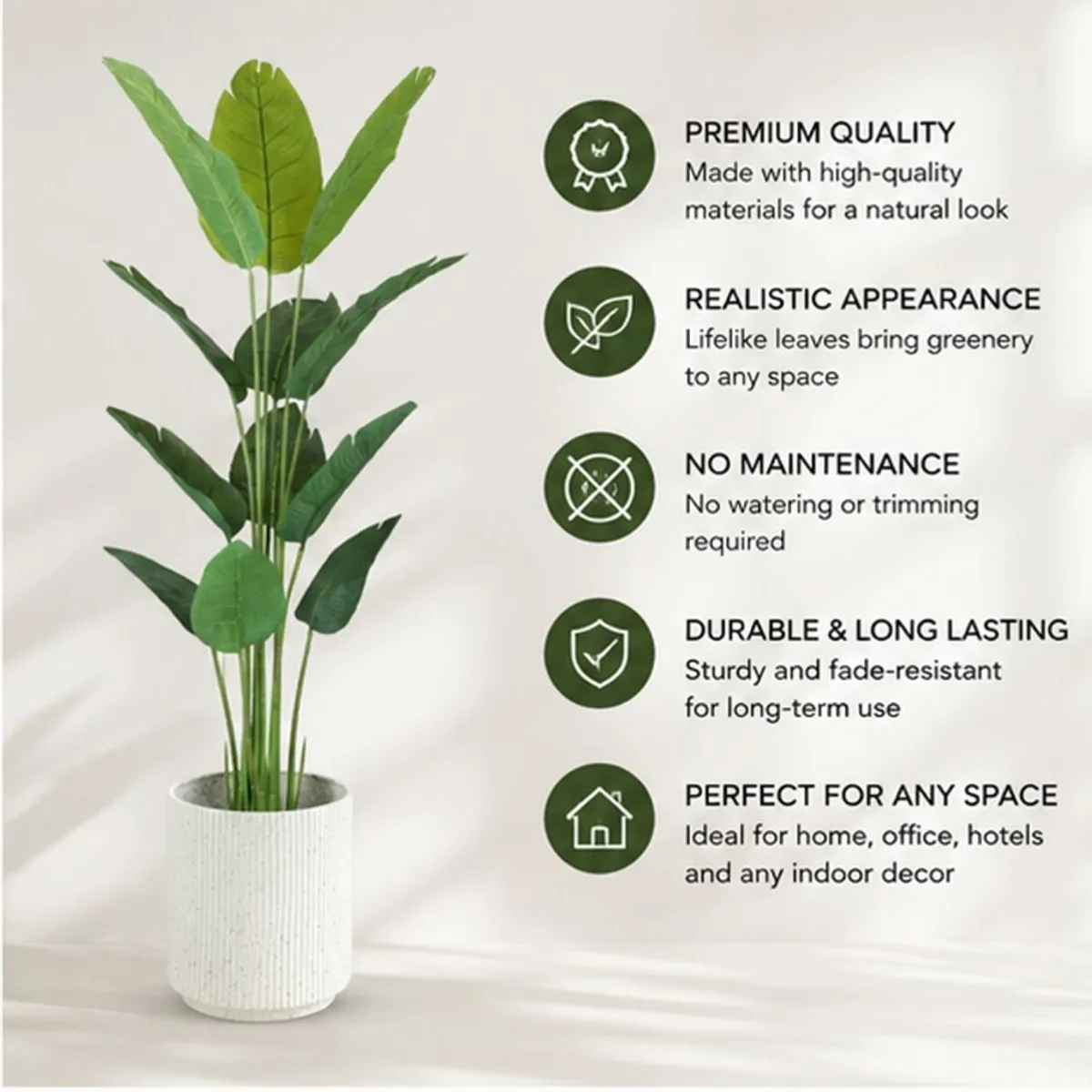 Artificial Bird of Paradise plant with green leaves and a pot shown against a plain background