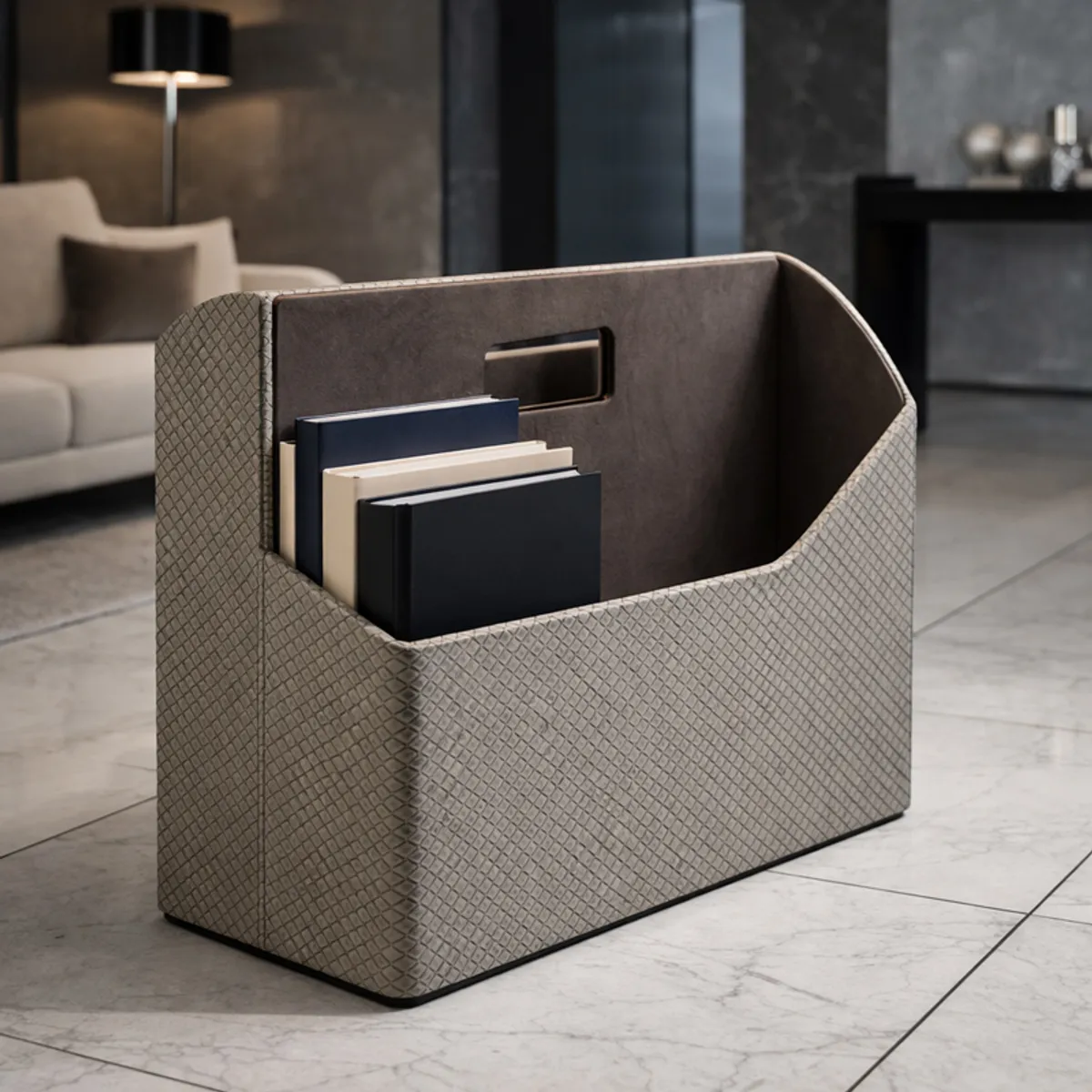 Grey desk organiser holding books against a contemporary dark interior