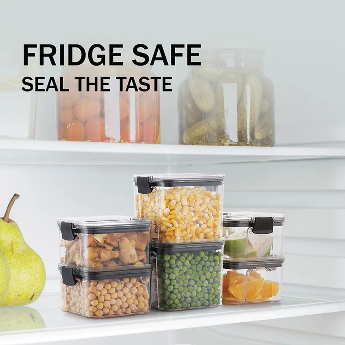 Clear storage containers with black lids stacked inside a refrigerator