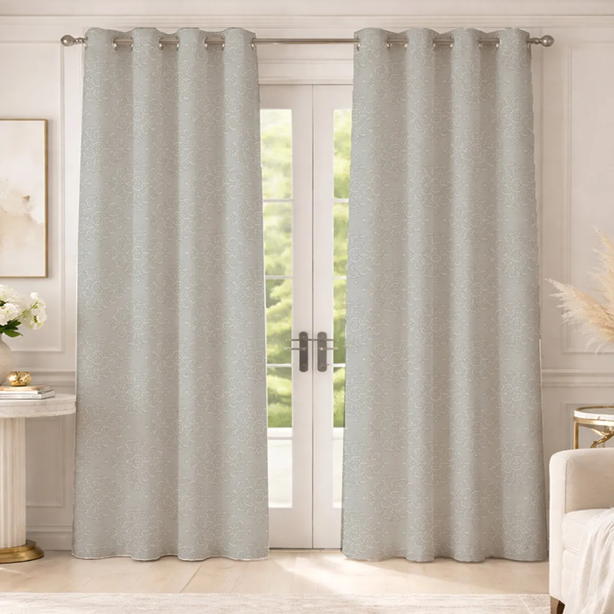 Set of two grey eyelet curtains with damask pattern over glass doors