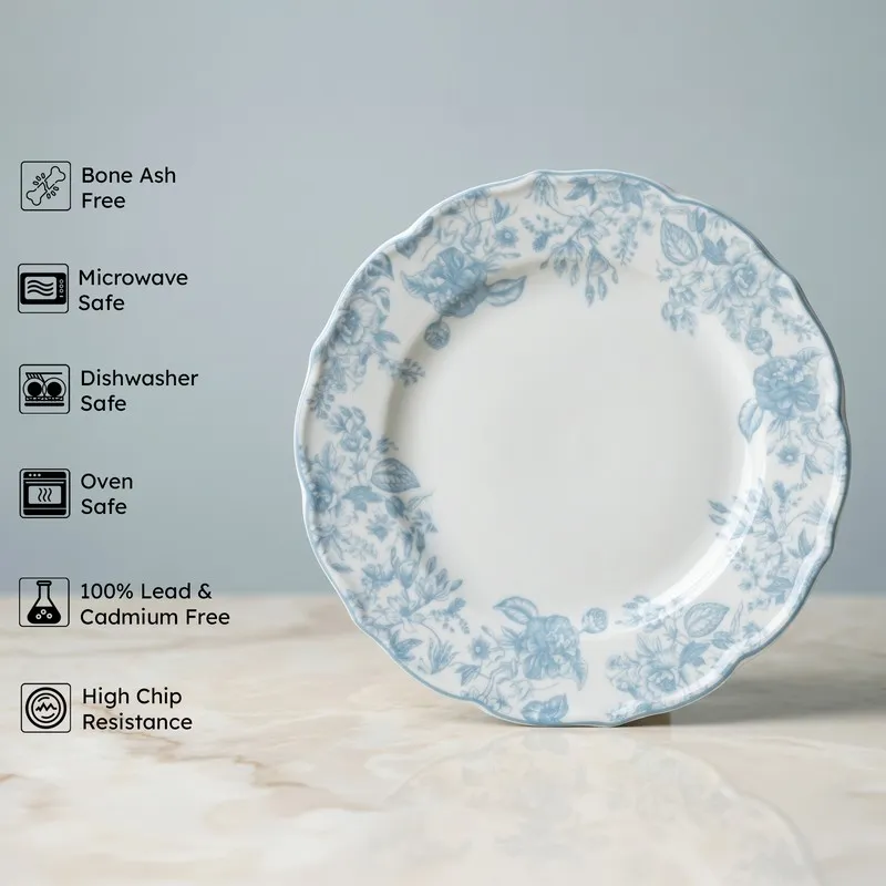 Blue and white floral dinner plate with scalloped edge