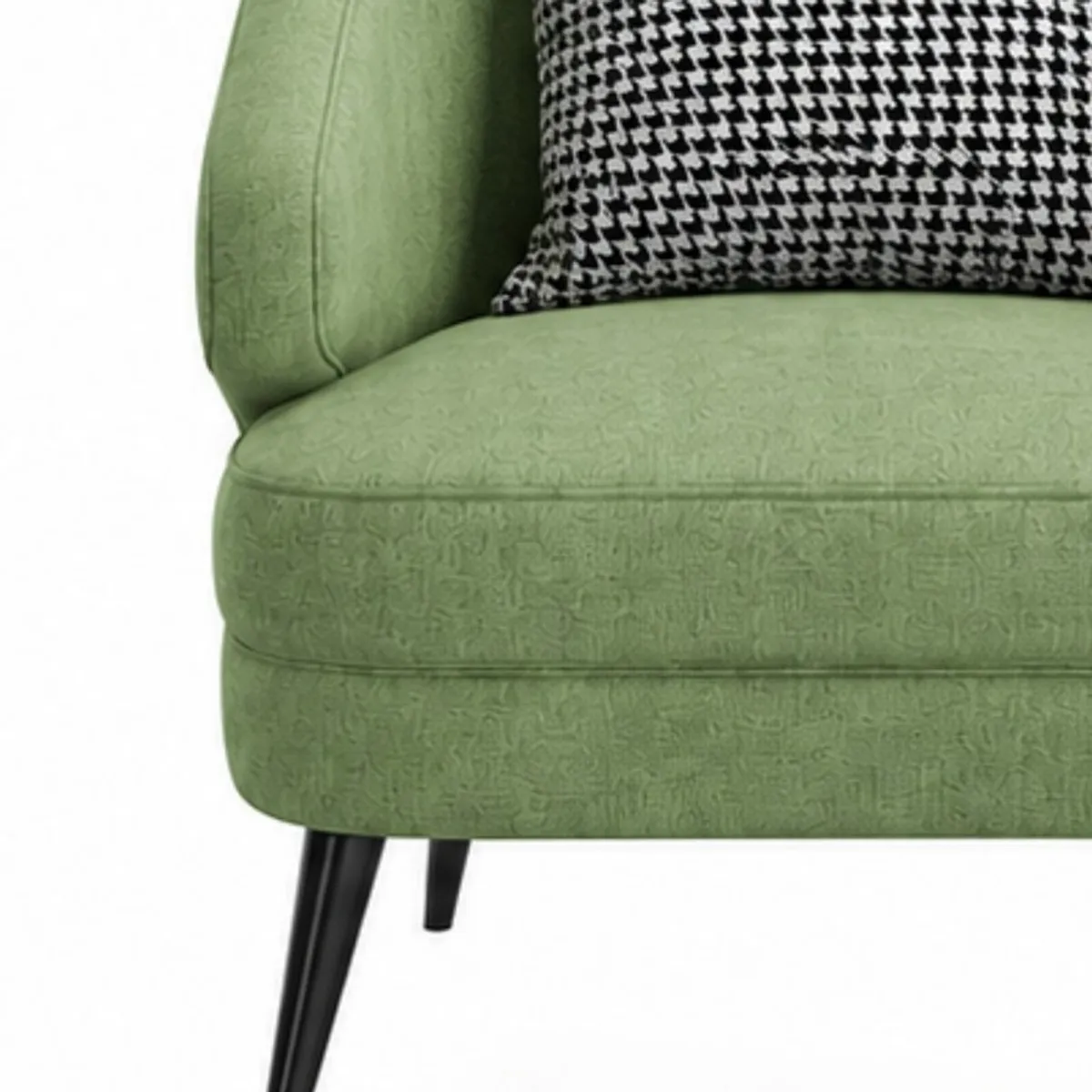 Close-up of the sage green textured upholstery and black-and-white cushion