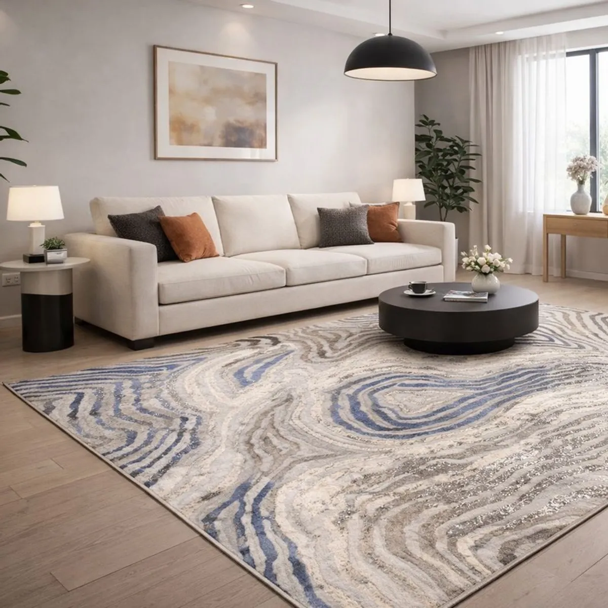 Large off white and blue abstract carpet placed in a contemporary living room