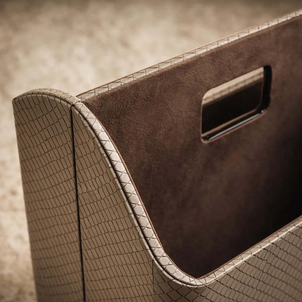 Close-up of the grey textured finish and rectangular handle