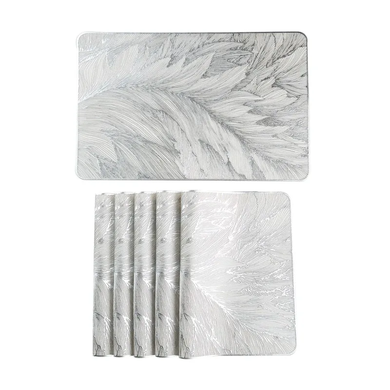 One grey table mat shown with the rest of the set partially stacked below