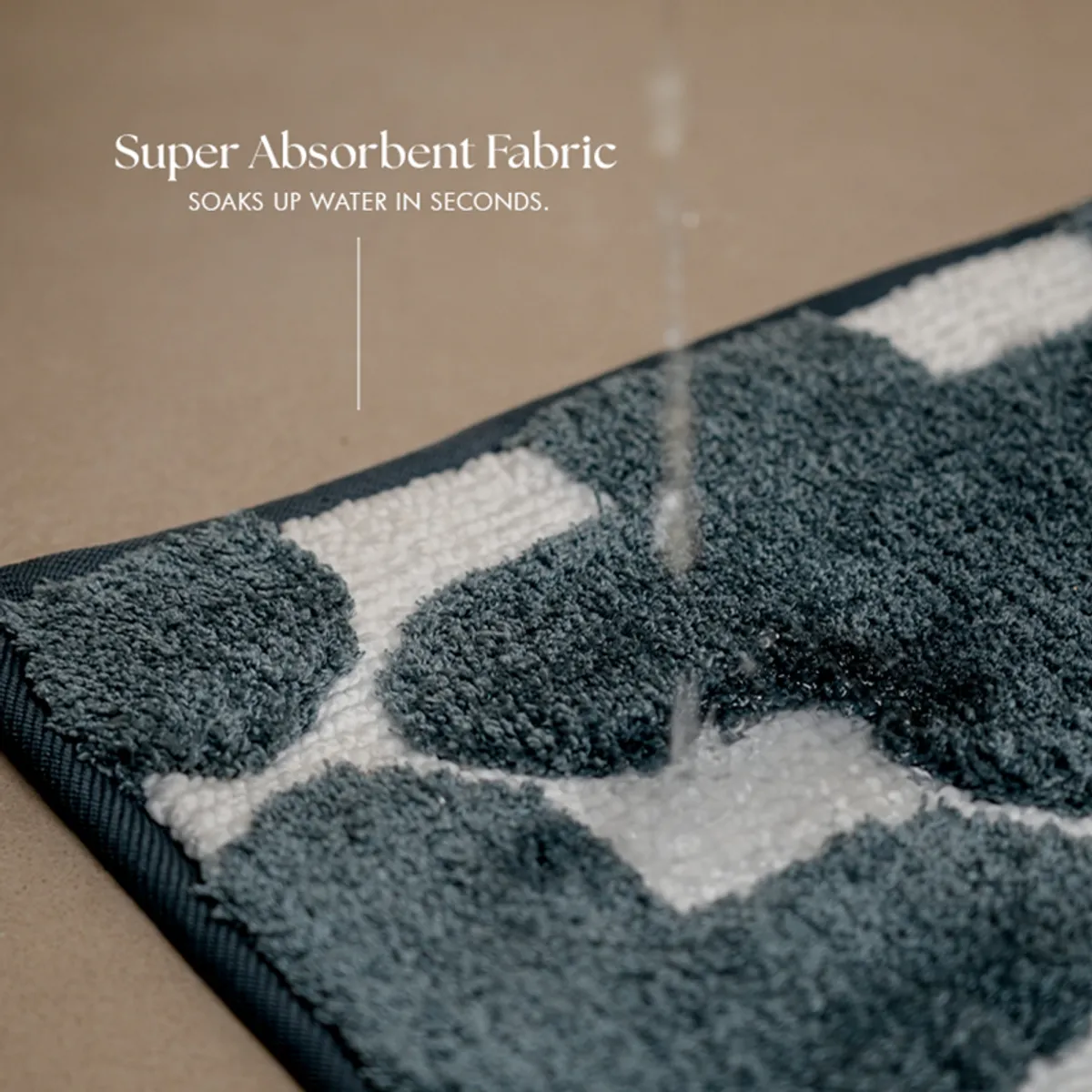 Close-up of absorbent textured blue and white bath mat fabric