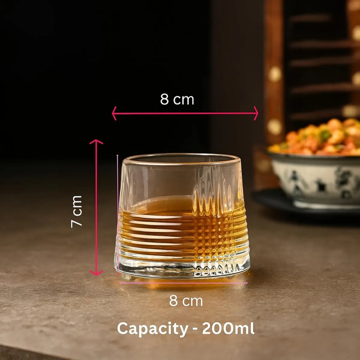 Clear textured whiskey glass with drink shown with size markings