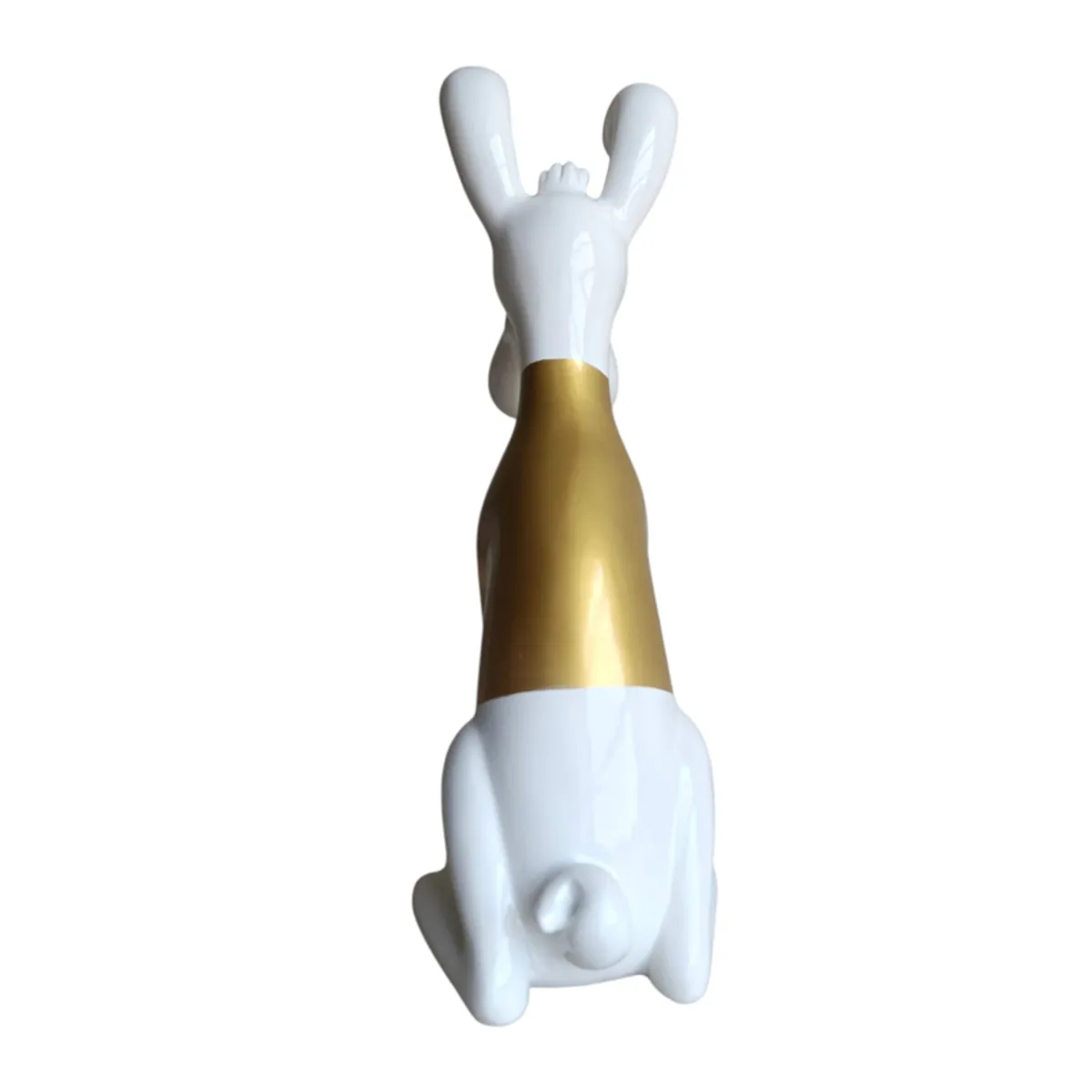 Back view of the white and gold hound sculpture