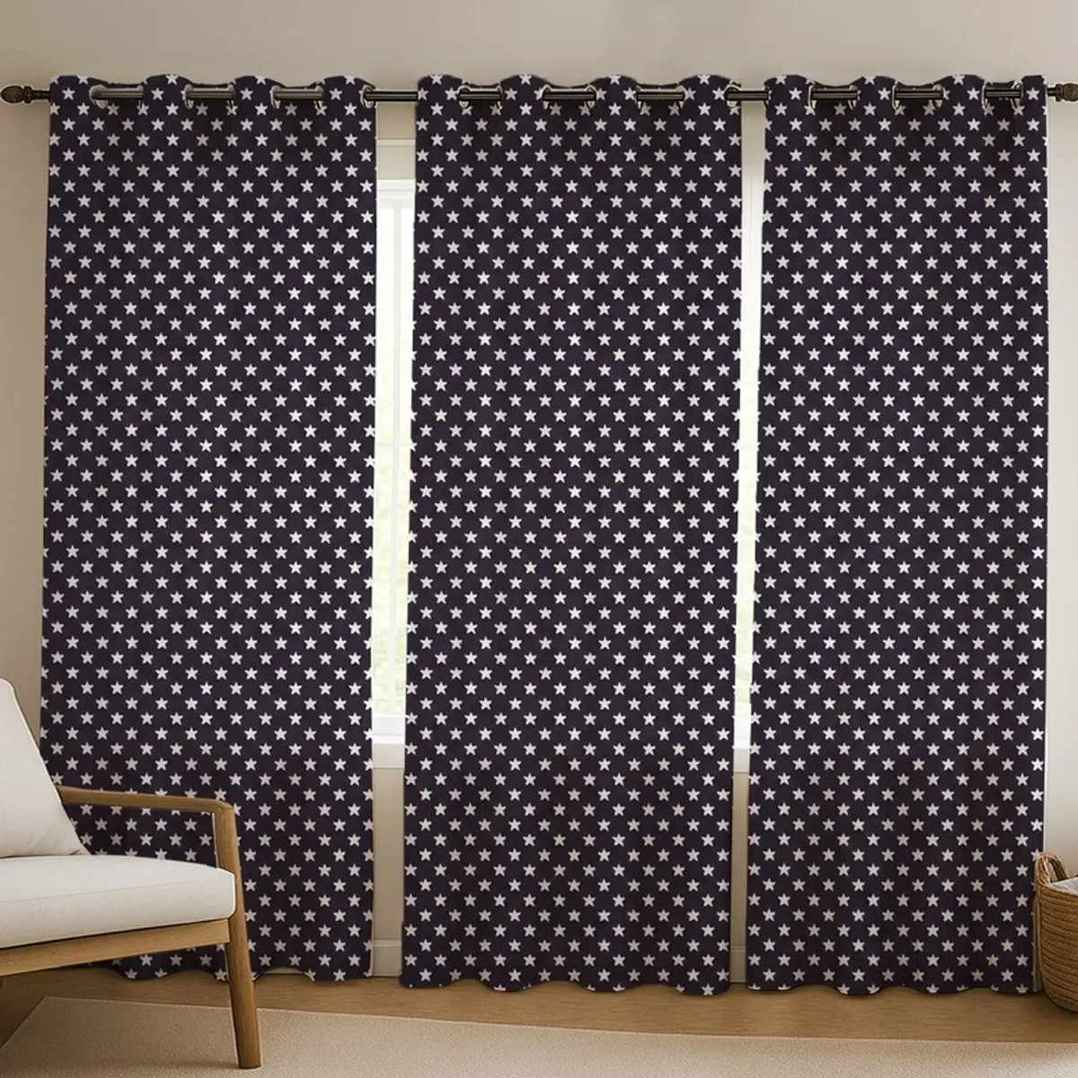 Three patterned black curtains covering windows in a modern living room
