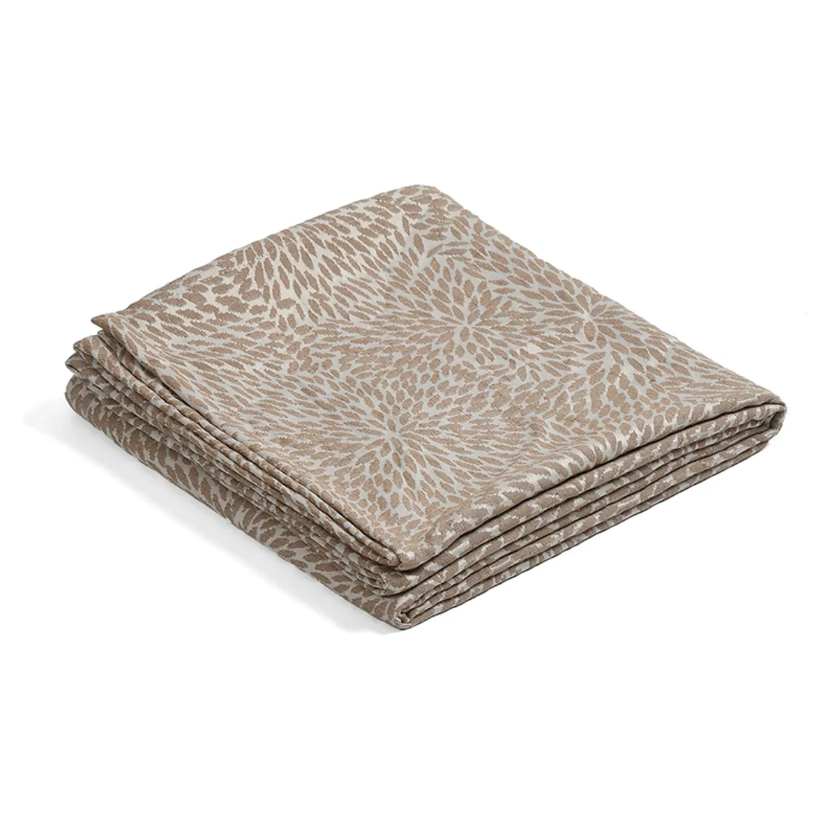 Folded brown and cream woven throw with all-over abstract pattern
