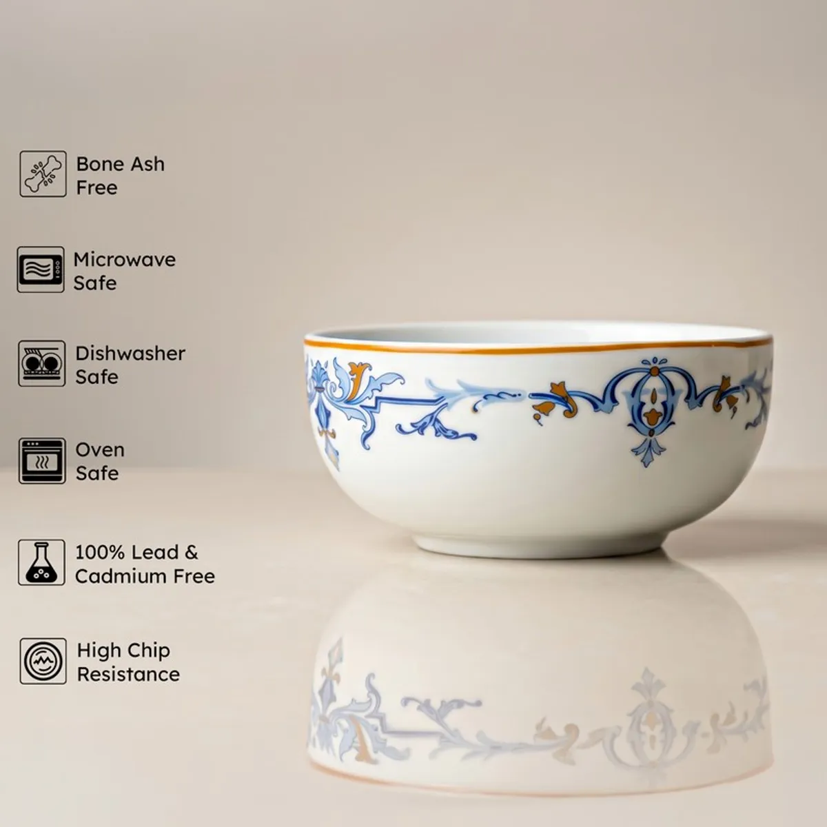 White porcelain serving bowl with blue ornamental detailing and gold rim