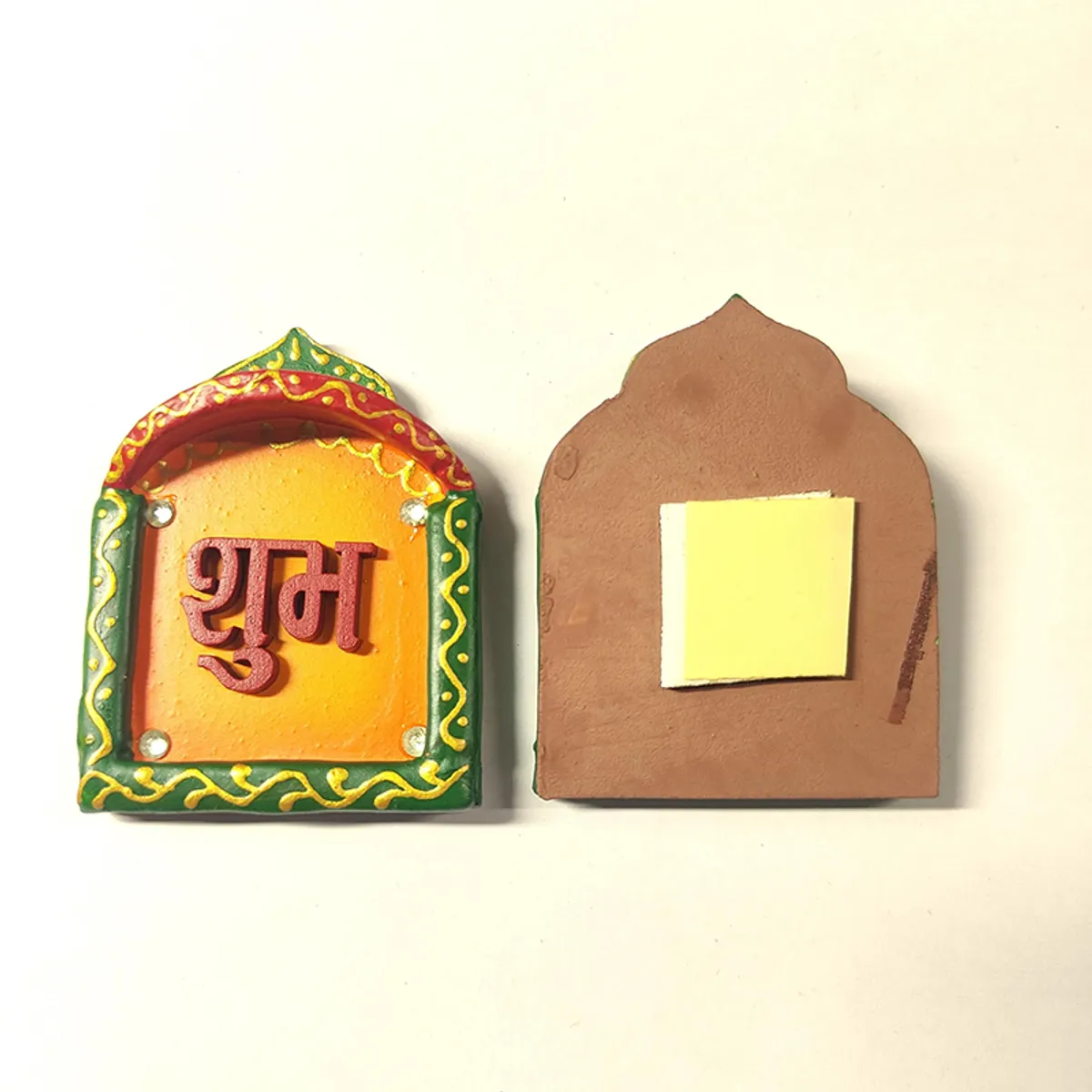 Front and back view of a yellow Shubh wall accent