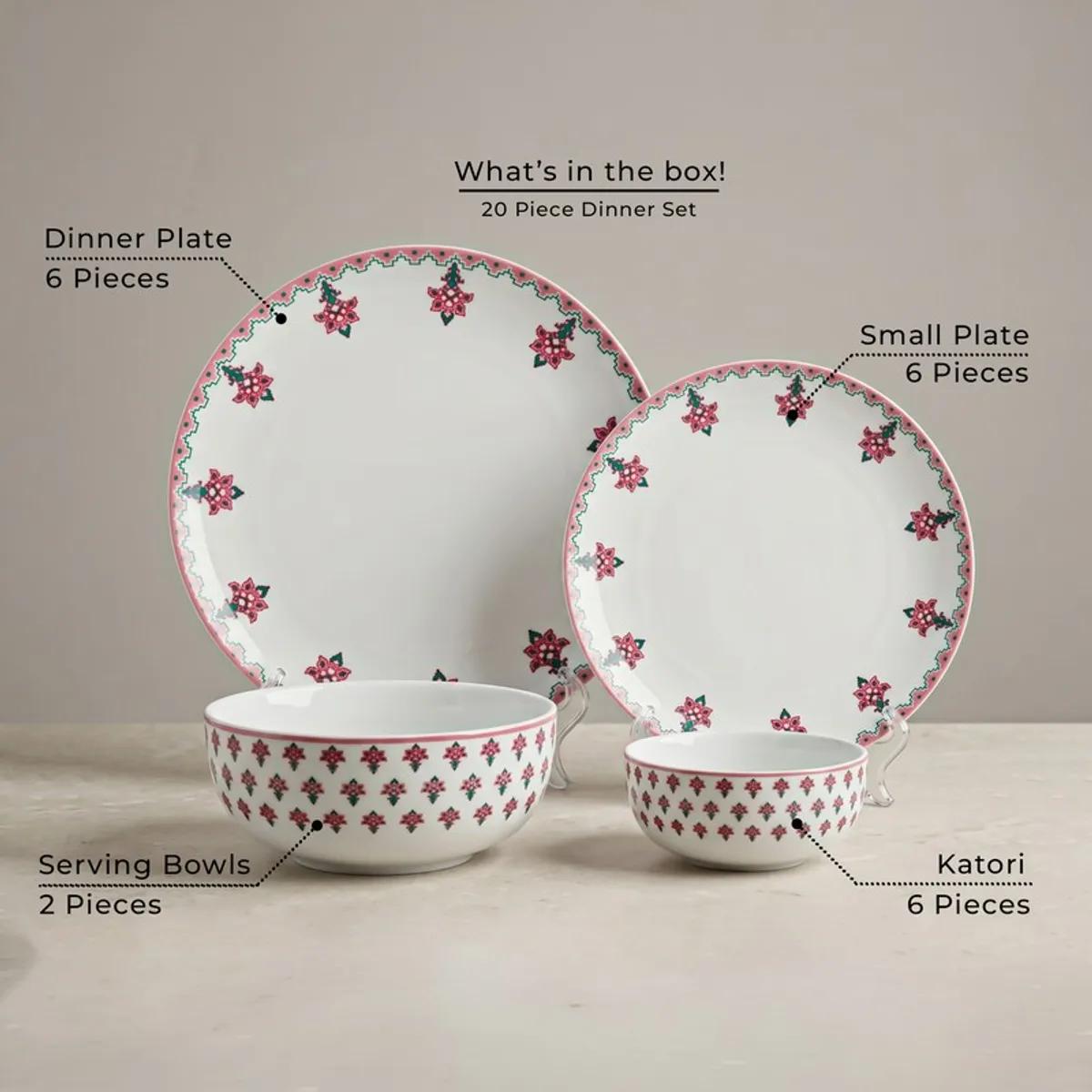 Pink and white dinner set pieces displayed together with floral detailing