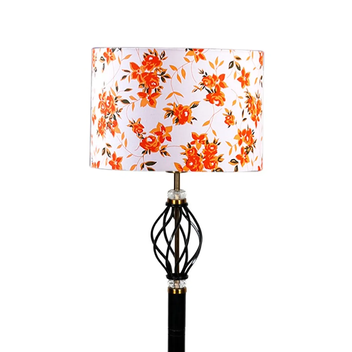 Close-up of floral drum shade and decorative black lamp stem