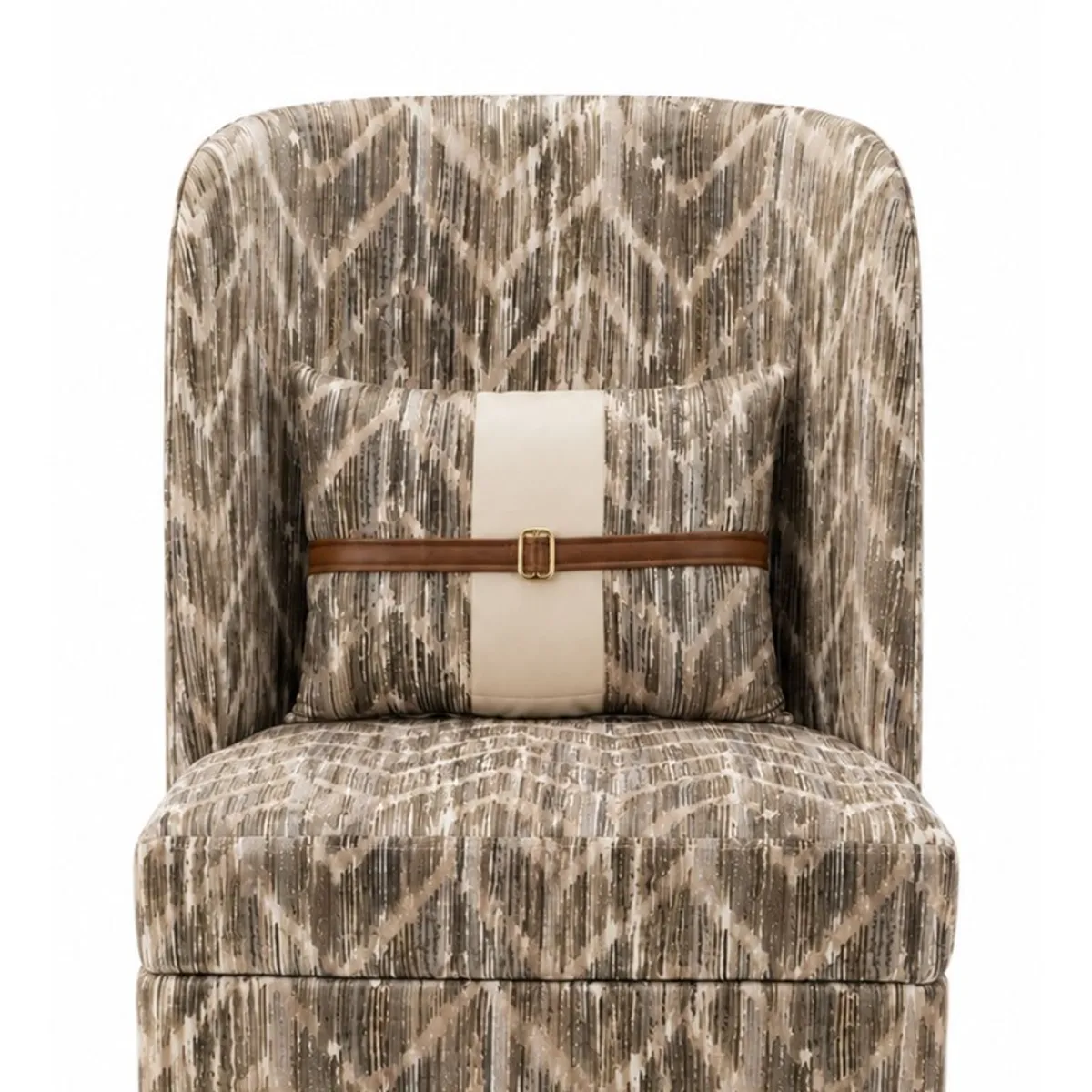 Front detail of patterned accent chair with a contrasting lumbar cushion
