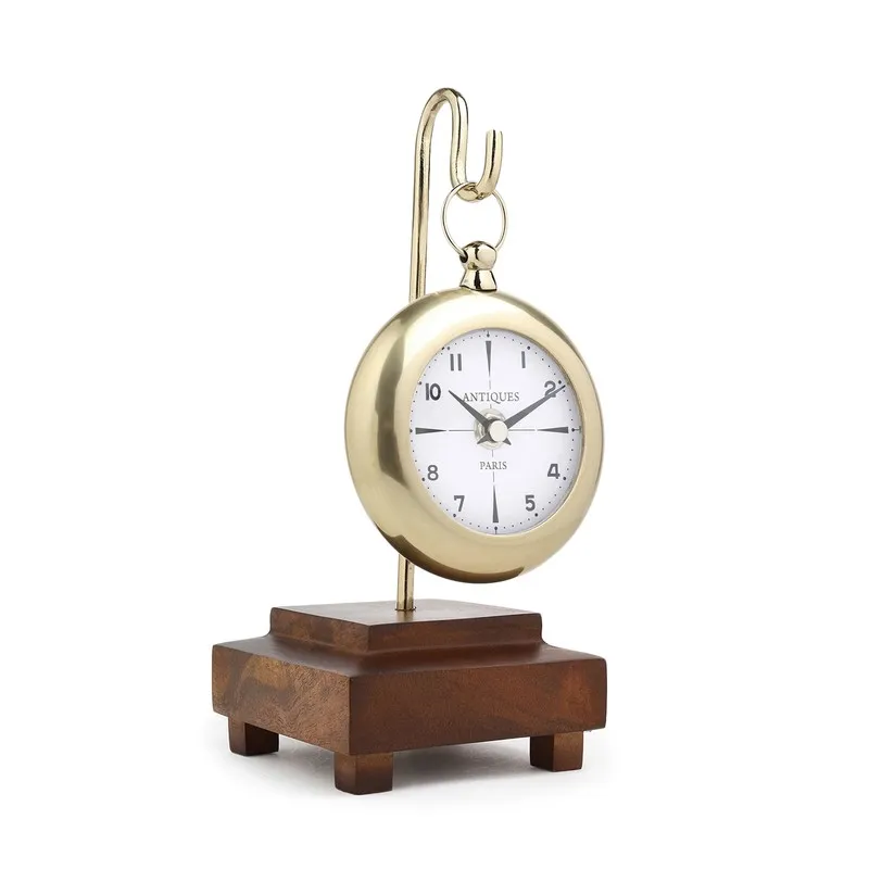 Gold round table clock with hook-style stand and stepped wooden base