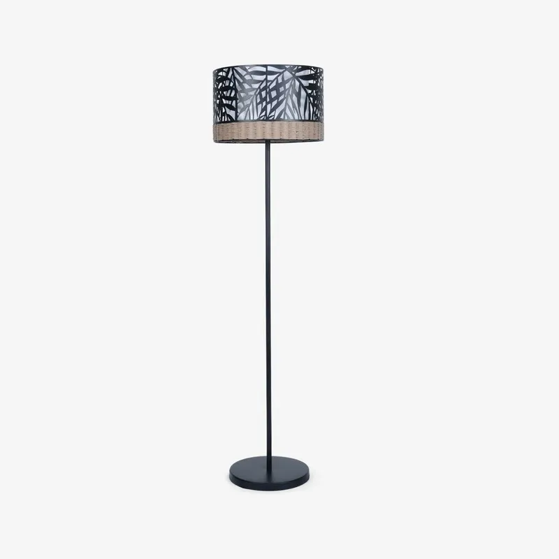Full view of black floor lamp with cylindrical patterned shade